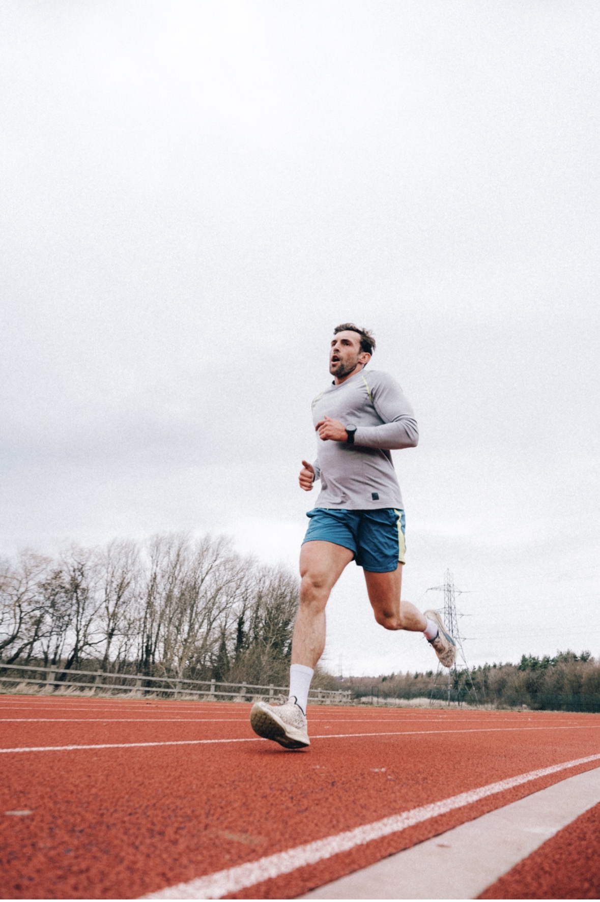 Alex Kitchen running on an athletics track